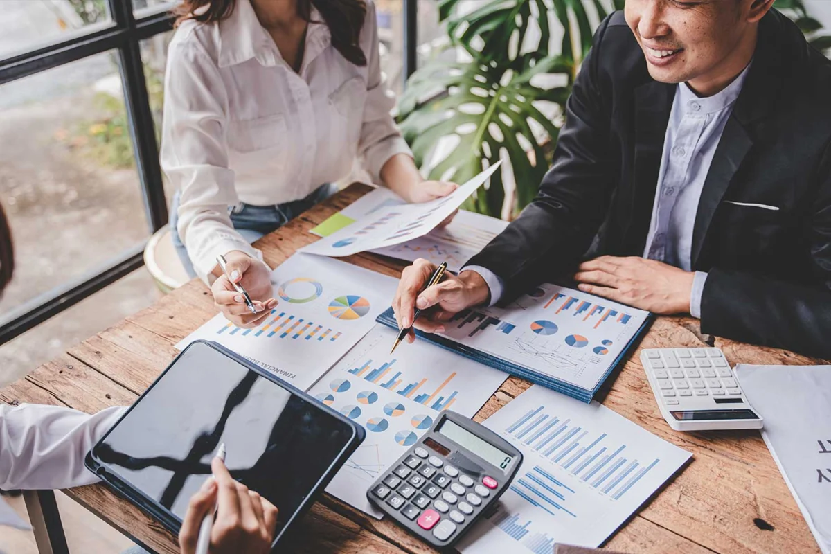 Barron Accounting professionals reviewing financial reports and business performance data in Albuquerque